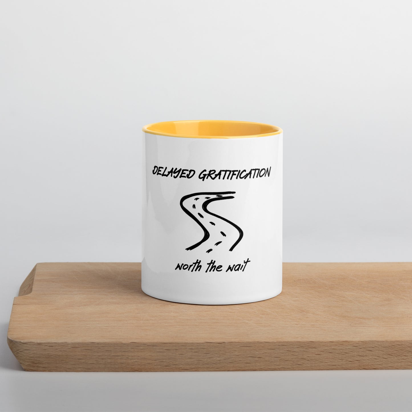 Delayed gratification mug with Color Inside